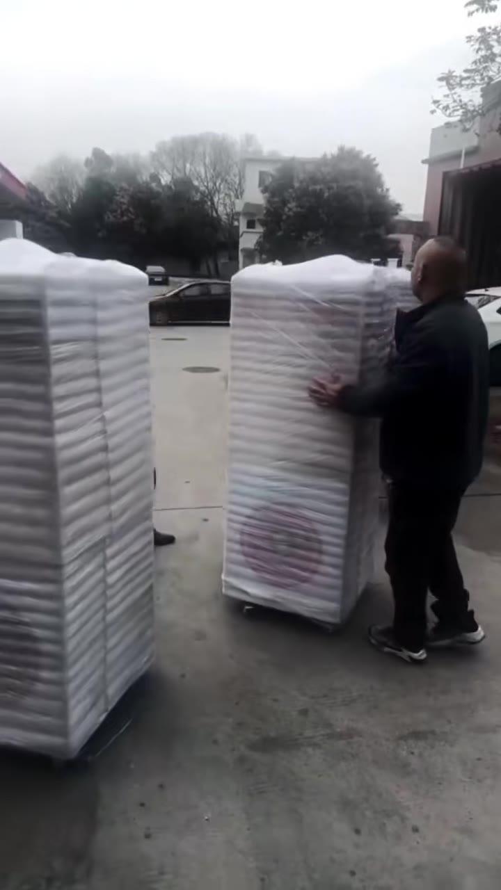 Video showing wrapped Jisun amusement machines during loading preparation