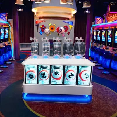 Front view of a 5P350 Pick 5 bingo machine with five clear mixing drums above an illuminated white console in a game hall