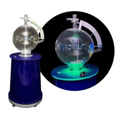 Composite view of the fast draw lottery machine showing unlit full body and a closeup of the illuminated ball chamber