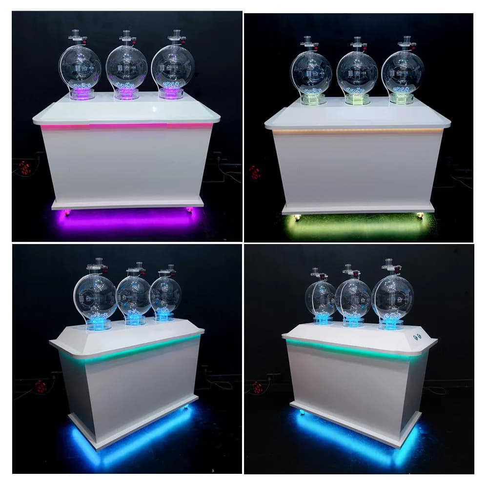 Custom pick 3 lottery machine with three clear globes on a white console, lit by purple, green and blue LED strips.