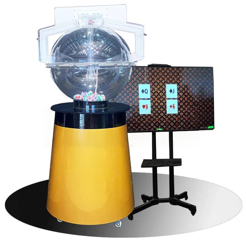 Front view of a YP800 lotto machine with a clear ball chamber, yellow-black base and colorful balls, beside a card result display screen on a stand